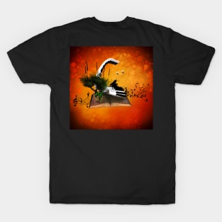 A piano is flying out of a book. T-Shirt